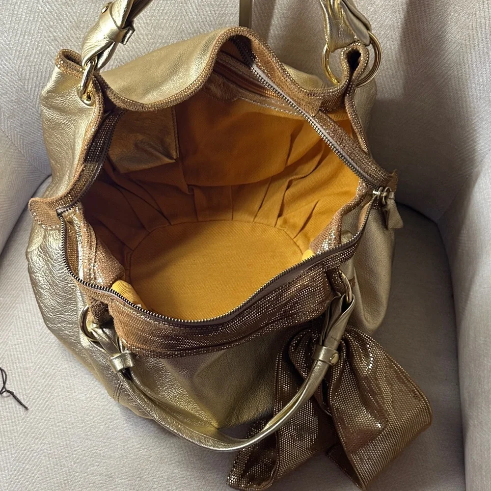Sofia C. Luxurious Gold Shoulder Leather Bag with Leather Bag Charm